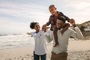 Family enjoying a beach vacation package